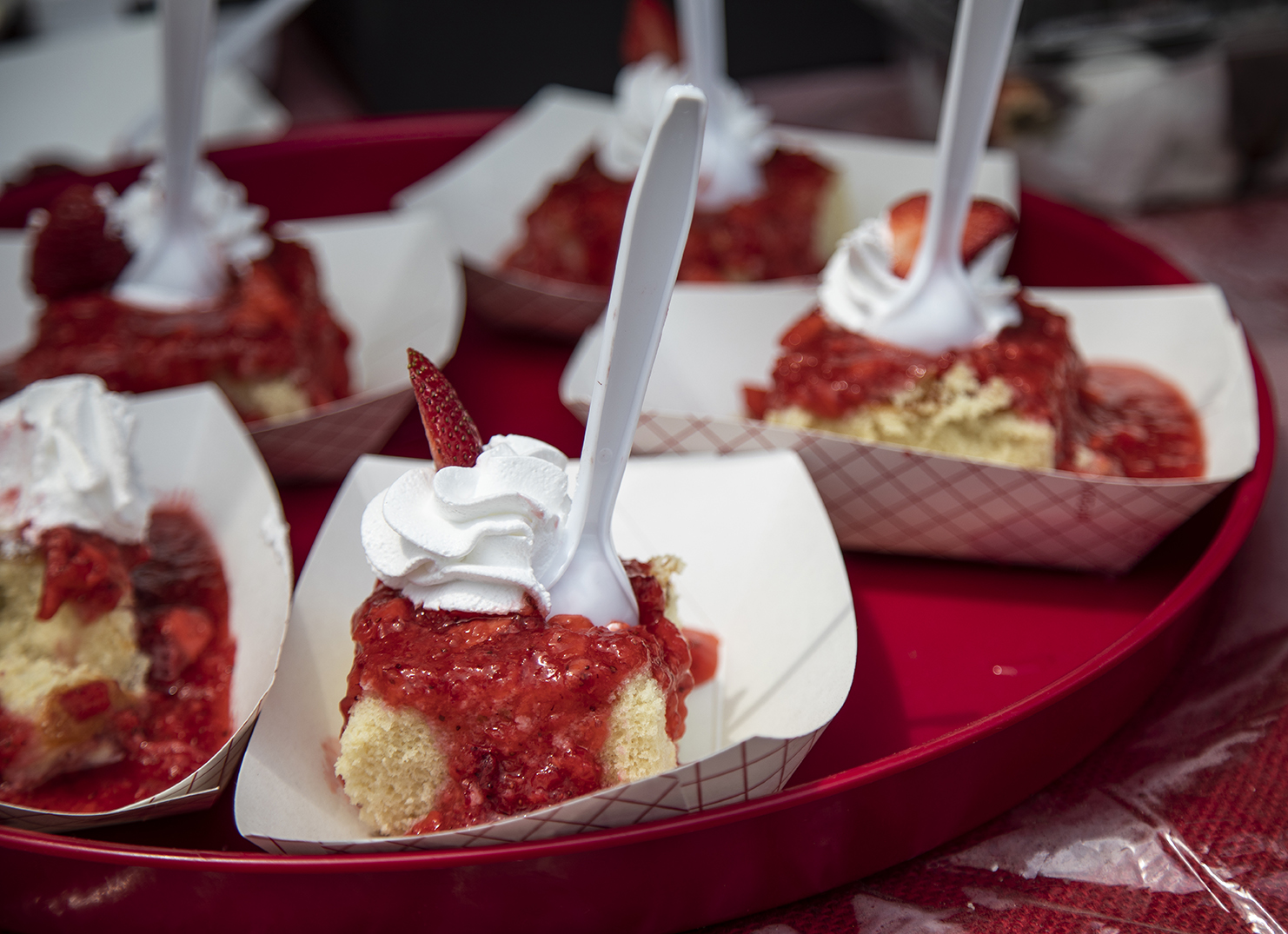 Strawberry treats topped with whipped cream at Ponchatoula Strawberry Fest.