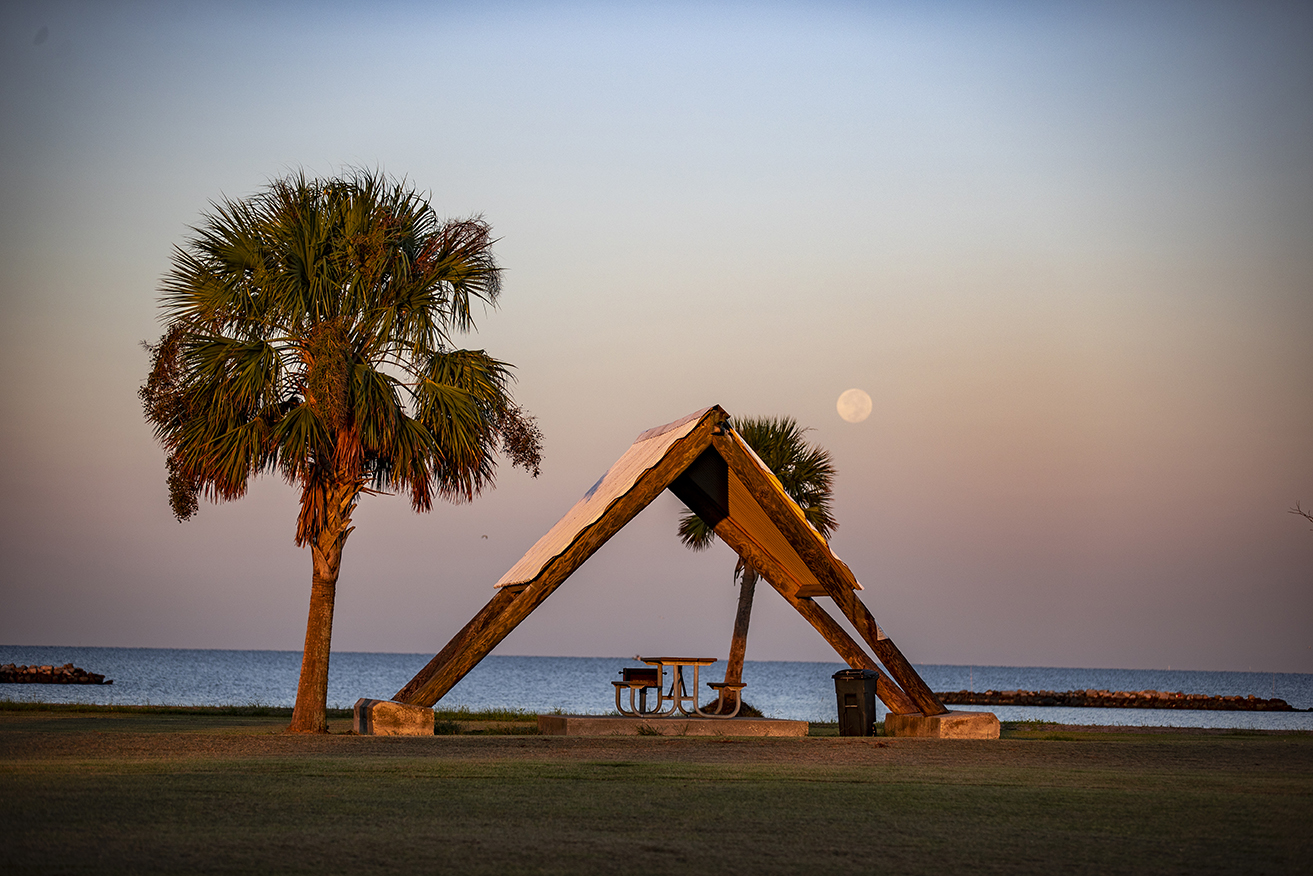 A picnic pavilion during sunset at Cypremort Point State Park.