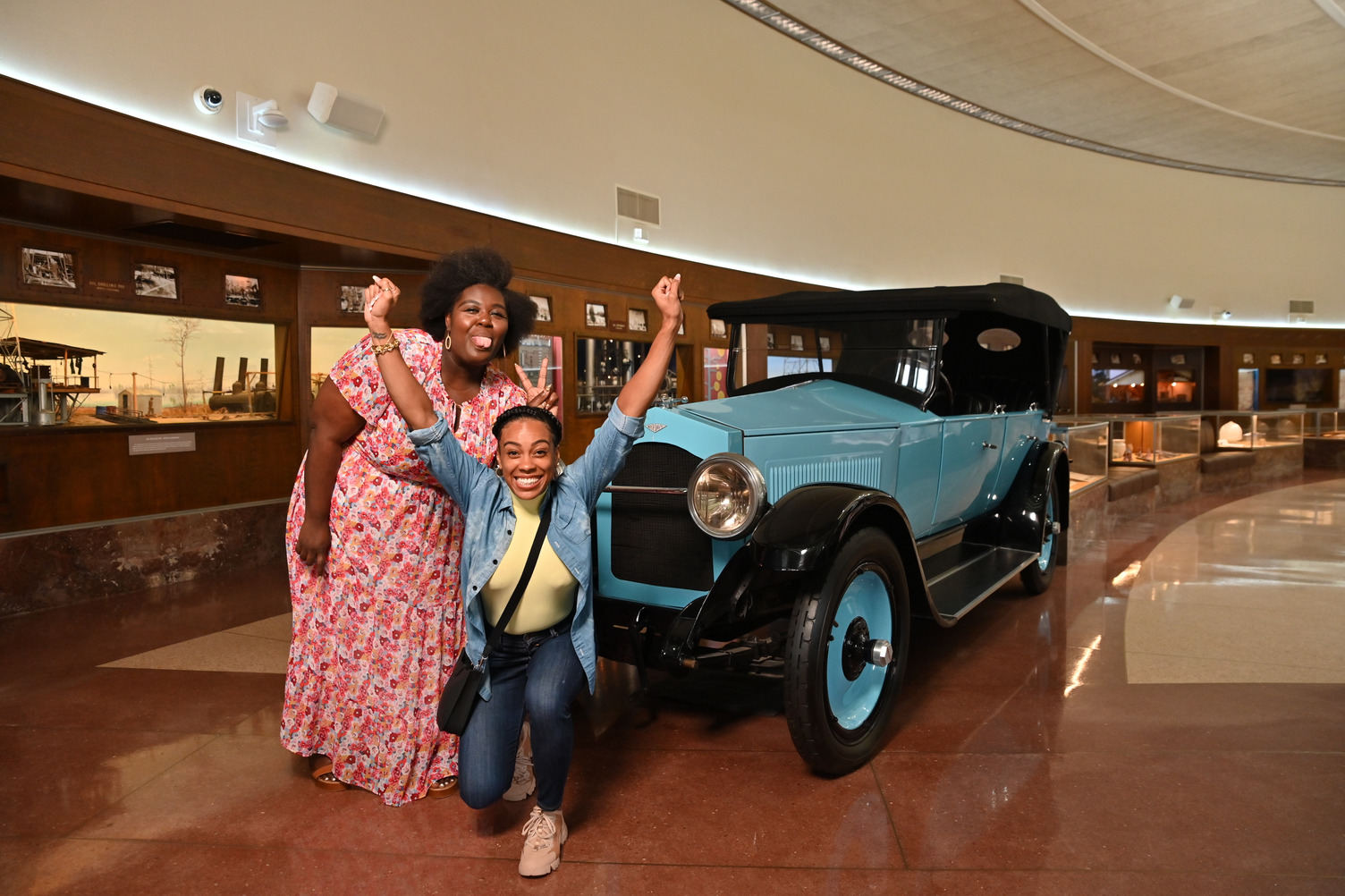 210519_Louisiana State Exhibit Museum_678.jpg excited at the Louisiana State Exhibit museum in front of a blue vintage car