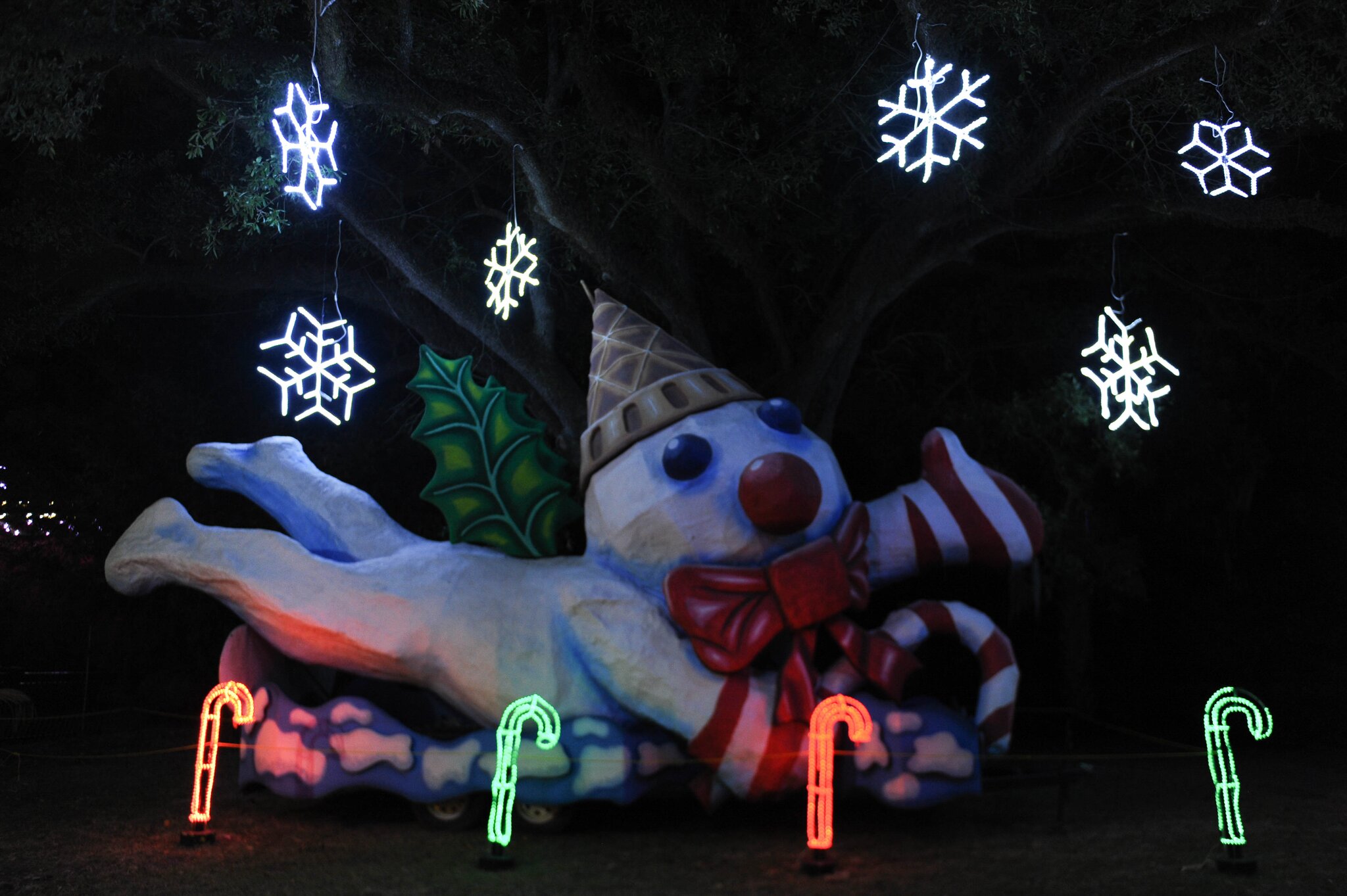 A playful snowman figurine welcomes guests to Celebration in the Oaks.