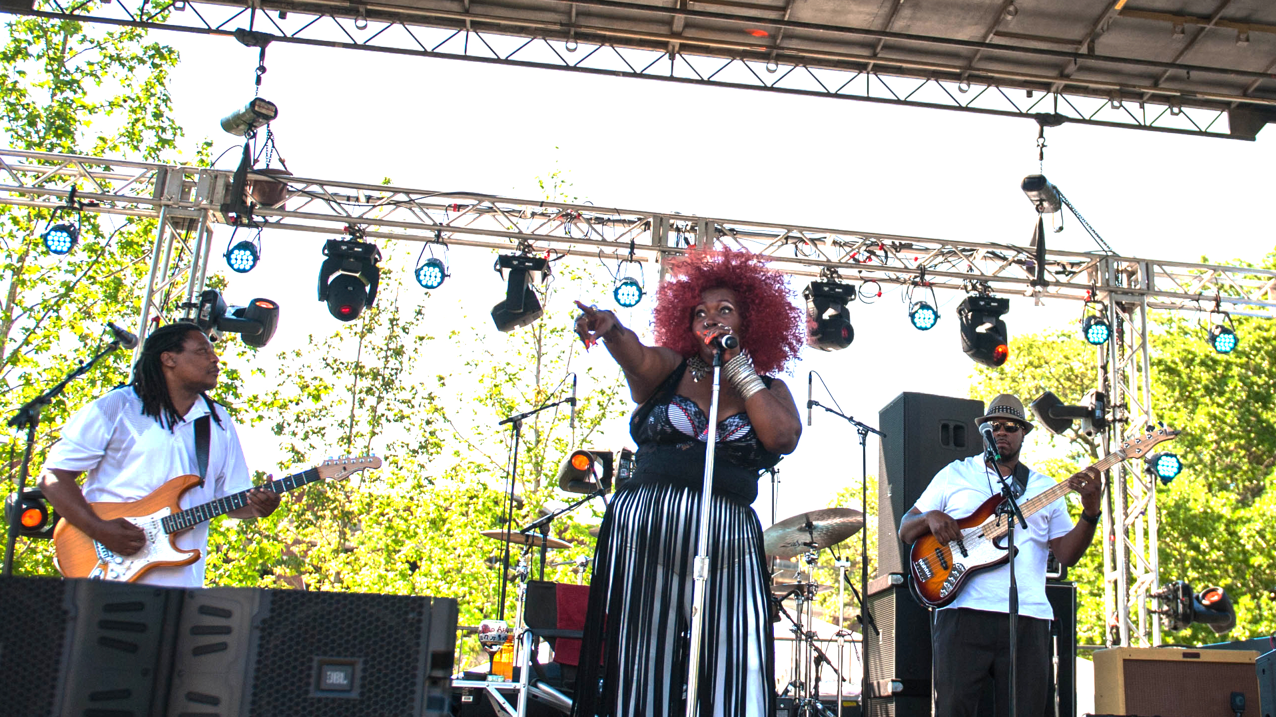 Soul performers play music for a crowd.