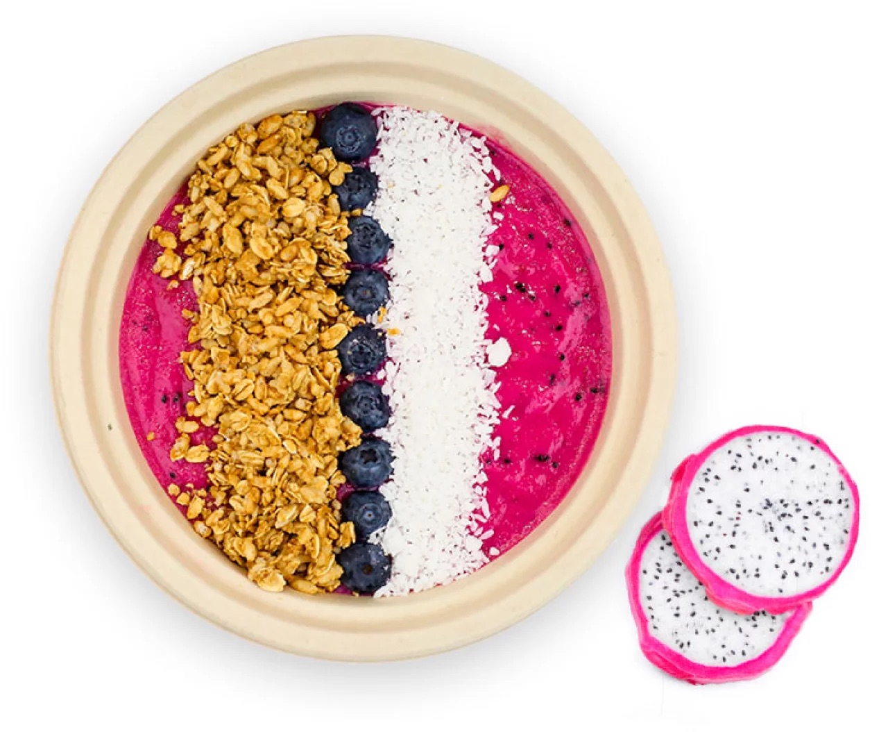 A beautiful dragon fruit bowl has a pink smoothie, granola, blueberries and coconut, from Main Squeeze in Lake Charles