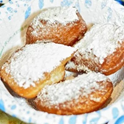 Powdered-sugar-dusted beignets from Meals from the Heart in New Orleans