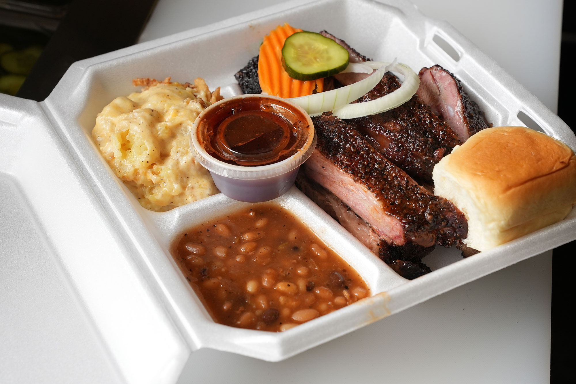 Barbeque meal in a divided container