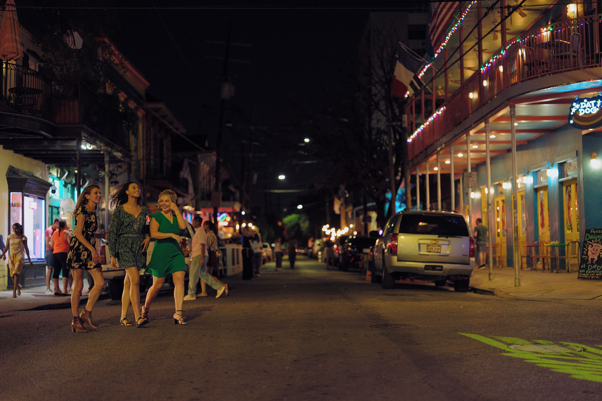 Friend group crossing street