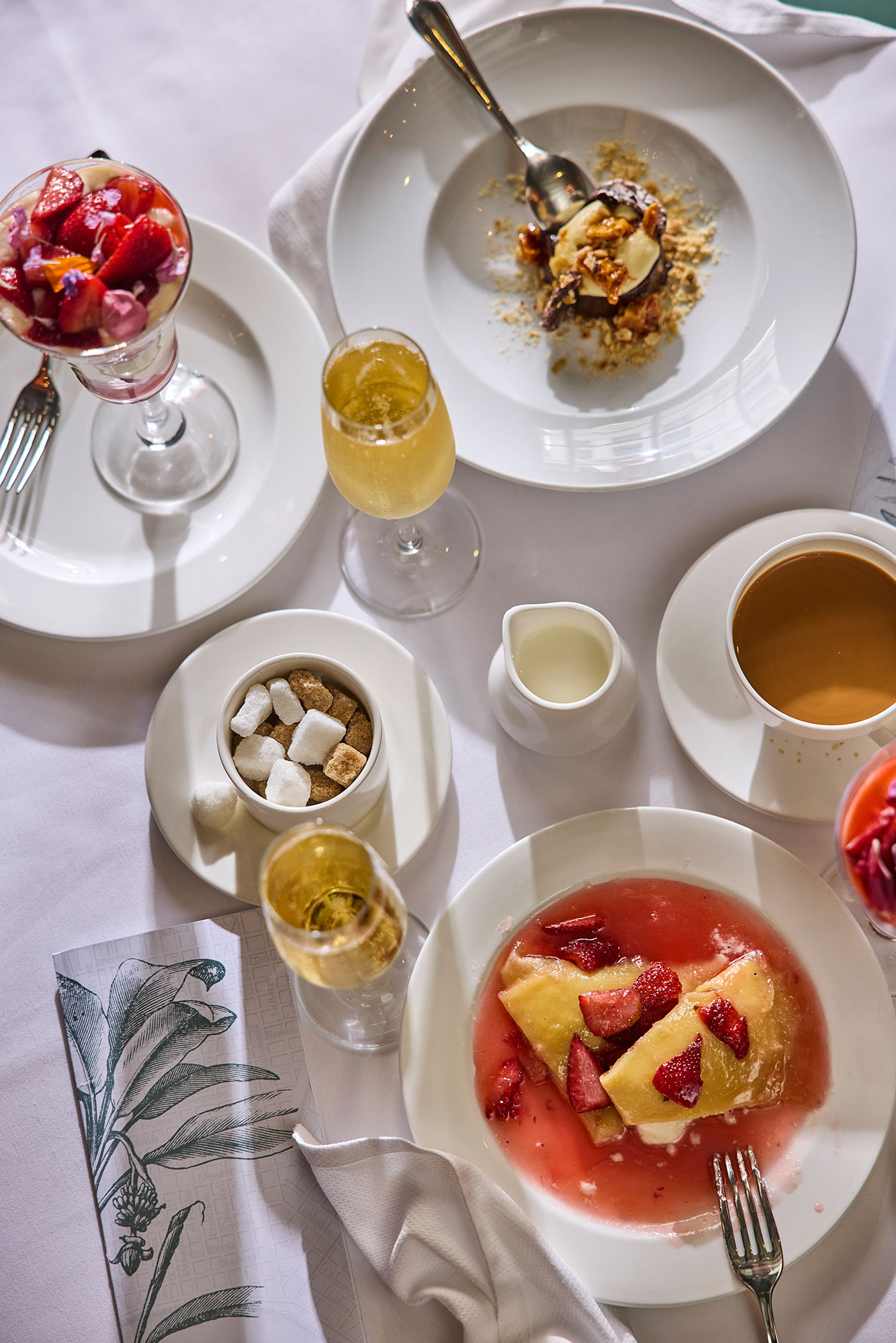 Restaurant table setting with plates and food