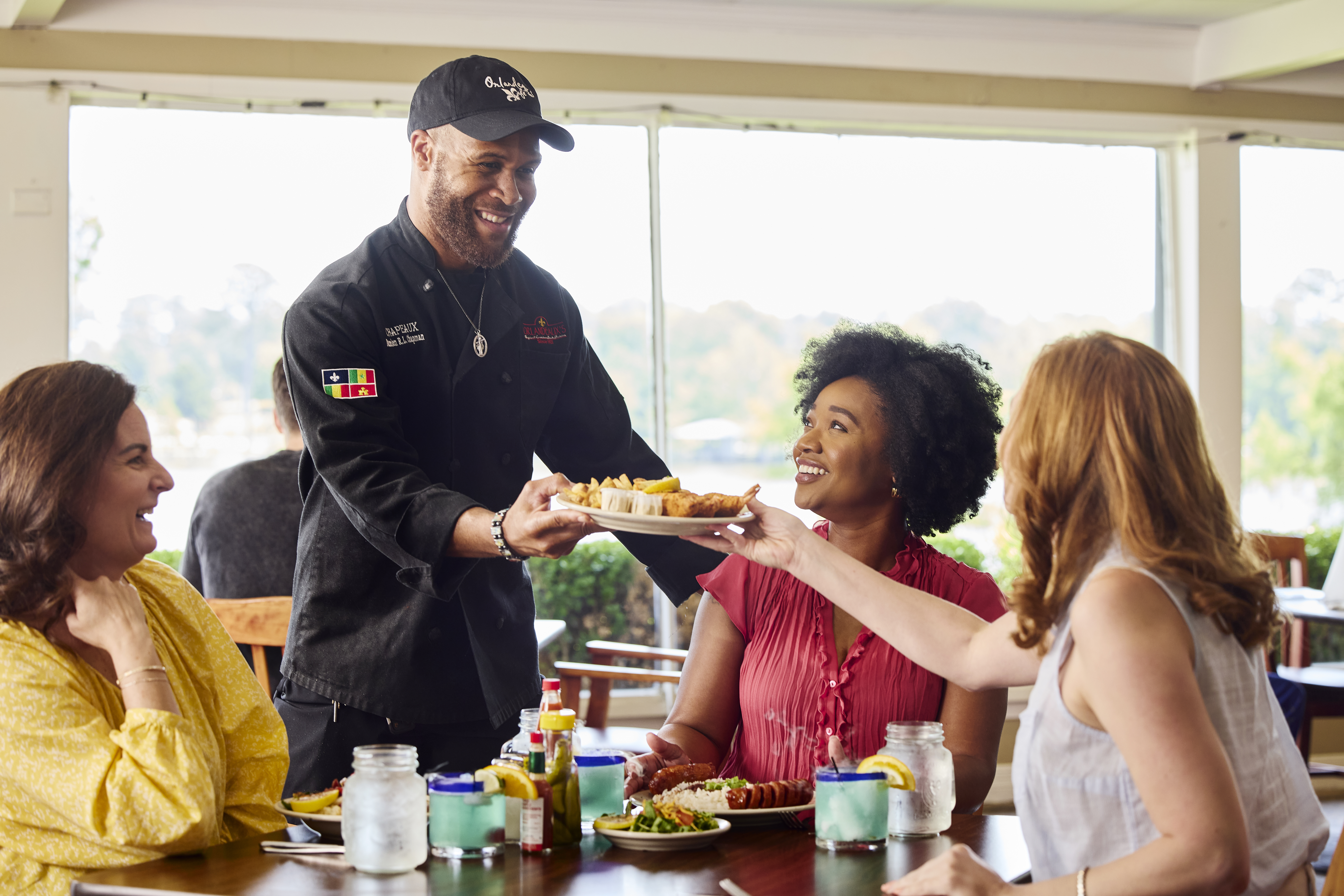 Guests enjoy a meal at Orlandeaux's Cafe.
