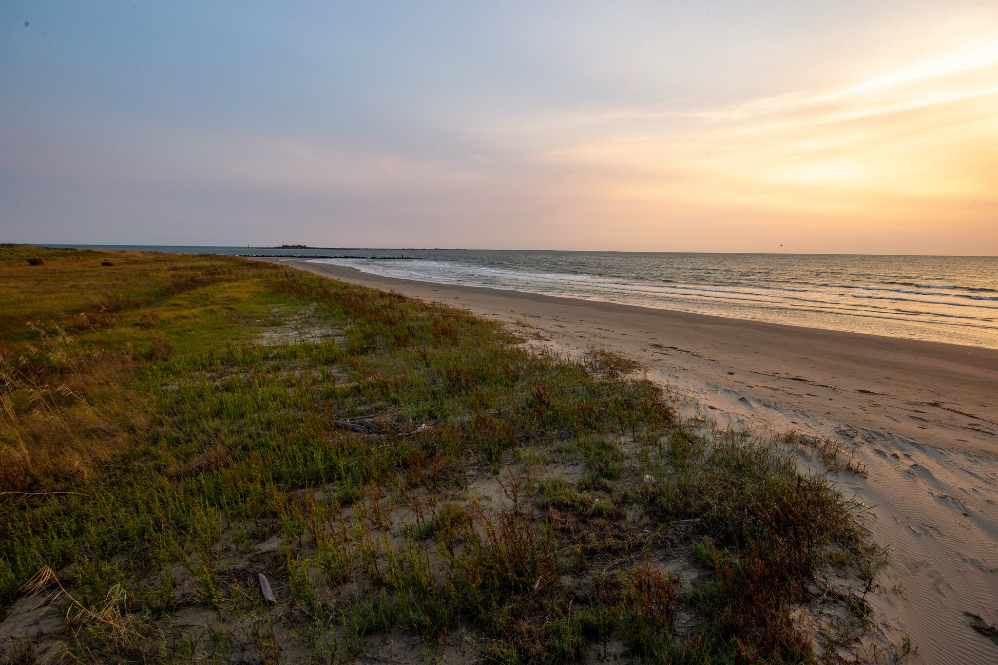 Grand Isle beach at sunset.