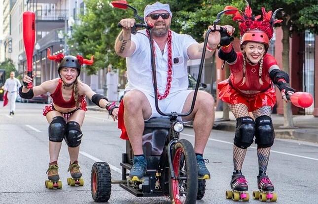 People run and roller skate through the French Quarter.
