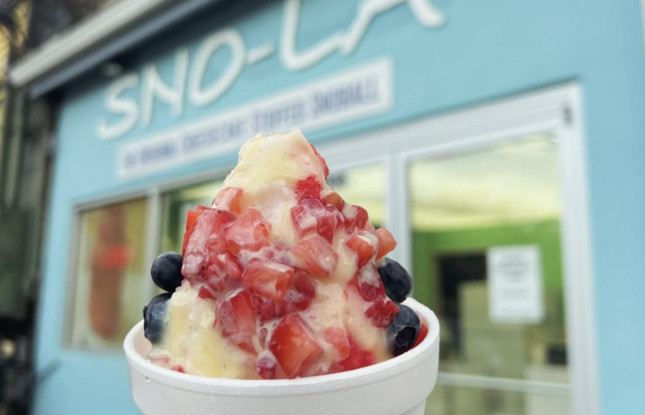 A Sno-La Snowballs treat topped with whipped cream.