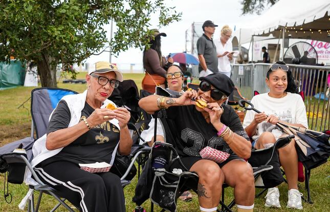 People enjoy fried chicken in New Orleans.