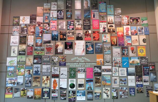 Louisiana Book Festival book cover wall at the State Library