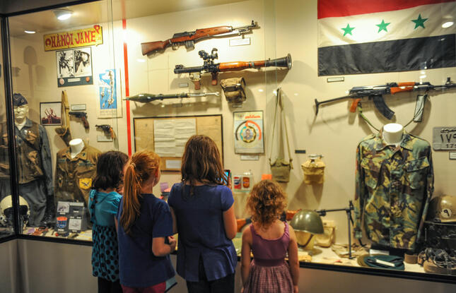 Children observing military artifacts at the North Louisiana Military Museum in Ruston, Louisiana.