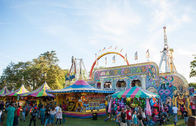 Colorful carnival rides and games at the Ponchatoula Strawberry Festival.