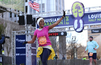 Team Louisiana - Runner at Finish line in Louisiana Marathon Baton Rouge