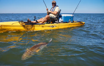 Kayak fishing for redfish in Grand Isle, Louisiana