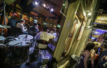 Picture conveying the sounds and energy of Frenchmen Street in New Orleans.