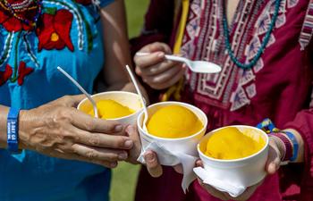 Enjoy mango freezes at the New Orleans Jazz & Heritage Festival.