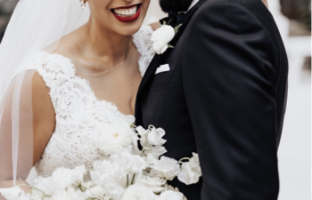 A couple smiles