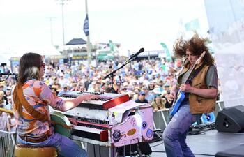 A band performs live at the Hogs for the Cause festival.