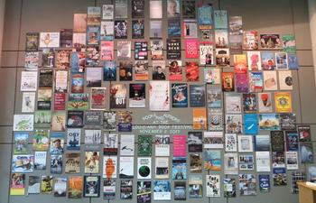 Louisiana Book Festival book cover wall at the State Library