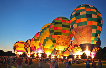 Red River Balloon Rally, balloon lineup at night 