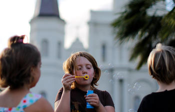 Kids playing at Jackson Square in New Orleans.
