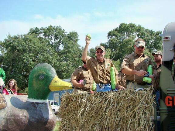 Duck hunting enthusiasts cheer at Gueydan, Louisiana's duck festival.