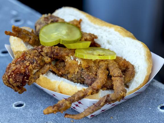 Seafood sandwich with pickles at New Orleans Jazz Fest.