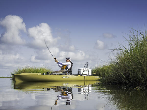 Kayak fishing near Bayou Lafourche.