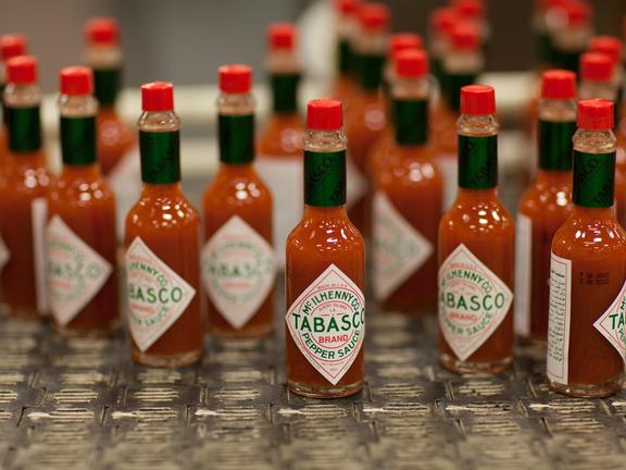 TABASCO bottles on the filling line
