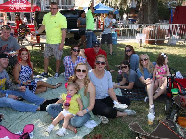 Families love gathering on the riverfront to picnic, rest and watch the boats sail the Tchefuncte. Photo by Anthony "Chopper" Leone.