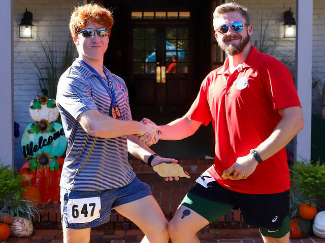 Runners Accepting Awards