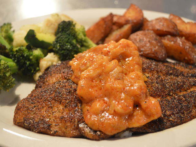 Blackened Catfish topped with etouffee