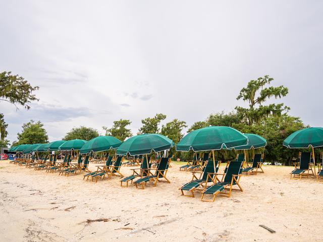 Relax in one of our chair and umbrella sets on the beach!