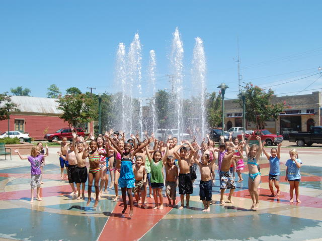 Cool down in the Parc Sans Souci fountain in dowtown Lafayette.