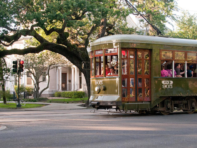 The St. Charles Streetcar stops right outside