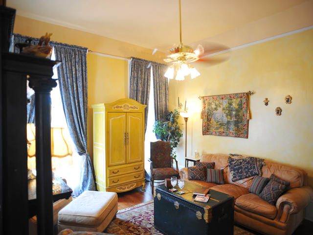 The sitting parlor of the Solarium Suite offers a comfortable space to unwind.