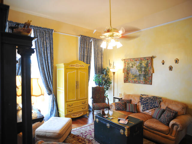 The sitting parlor of the Solarium Suite offers a comfortable space to unwind.