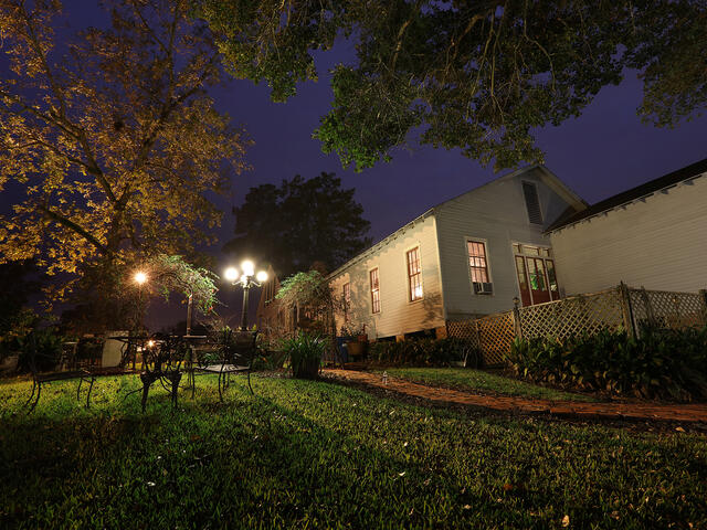 A wonderful backyard view of Bayou Teche from the garden area and porches