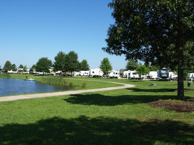 Beautiful walking path around the lake affords easy access to fishing and strolling the park