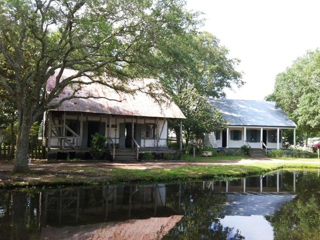 The Thibodeaux House. All of the homes feature period antiques, artifacts, and artwork.