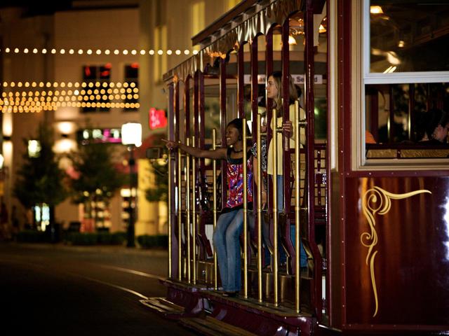 The Magnolia Belle Trolley at the Outlets at the Louisiana Boardwalk wisk visitors throughout the property.