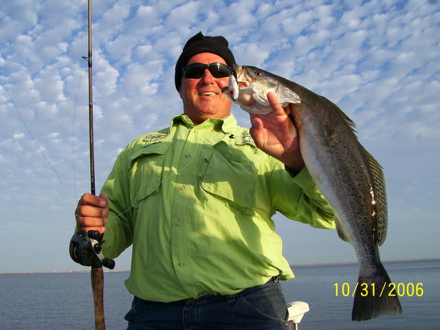 Capt. Mike Gallo with a BIG Speckled Trout caught on a Top water lure.