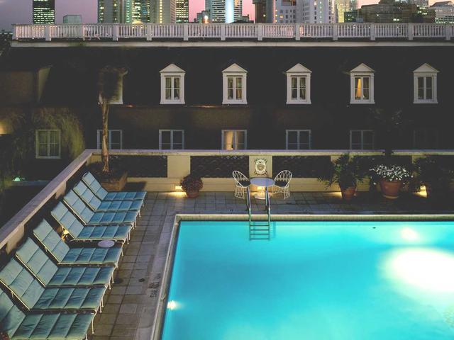 Night time view of heated roof top Salt water pool