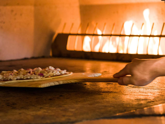 Our fire deck oven cooks your pizza in about 3.5 minutes!