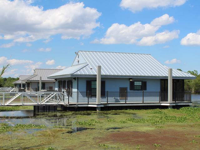 Floating cabins at Bayou Segnette State Park Photo