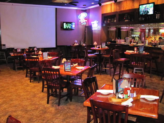 Laughing Gator Bar w/ the largest screen in town and NFL Sunday Ticket