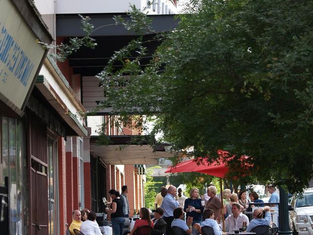 On many sping and summer evenings, The Robinson Film Center sets up an outdoor sidewalk cafe.  No movie ticket is required to enjoy the food and drinks from Abby Singer's Bistro. Photo