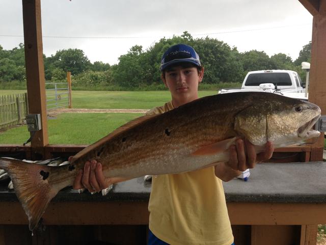 One happy customer with a big Redfish